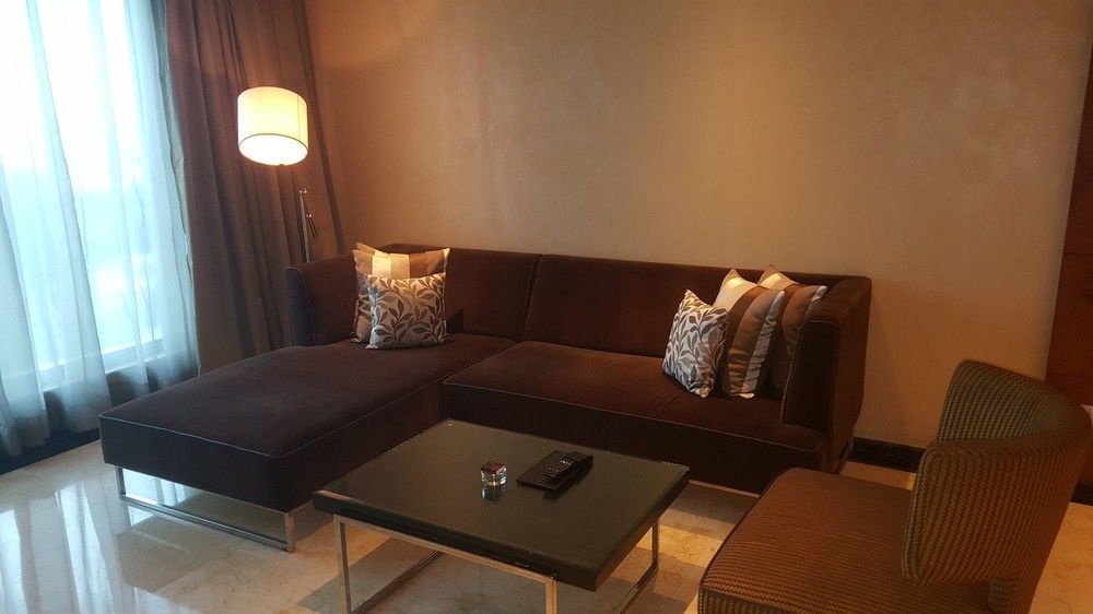 Vivanta Hyderabad, Begumpet Exterior foto A living room in a suite at the Ritz-Carlton, Kuala Lumpur